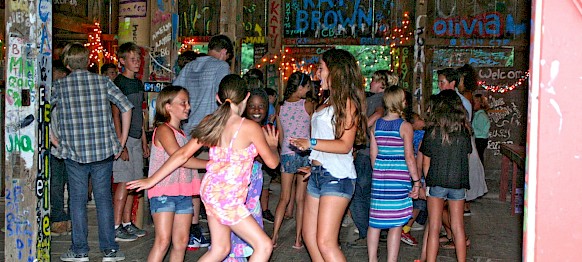 Erica has her whole cabin dancing it up in the barn!